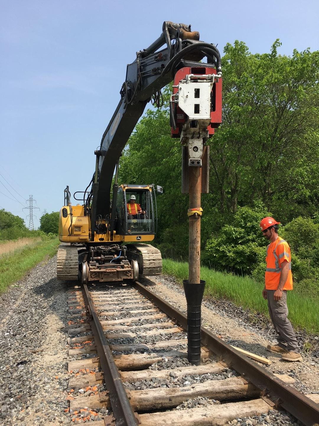 Geopier's GeoSpike system being installed on a railway.